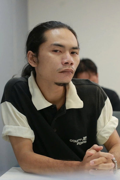 Uy Trần portrait
